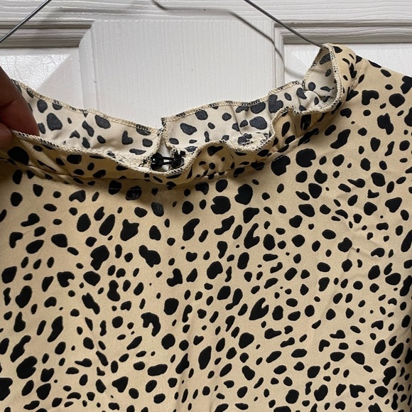 Womens leopard print cap sleeve tunic XL
New without tags - Picture 3 of 9